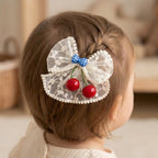Blue Bow Cherry Charm Hair Clip