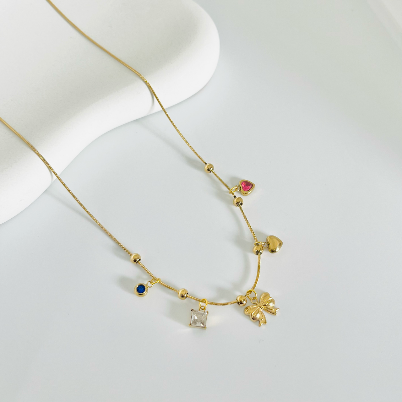 Multi Pendant Bow Gold Necklace