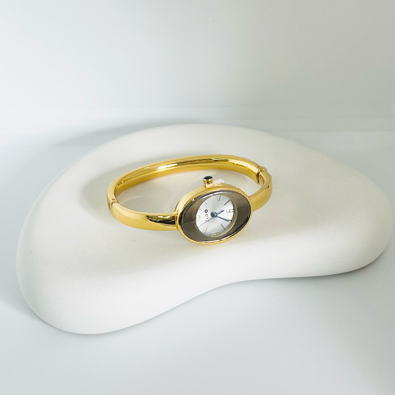 Oval Silver Dial Gold Watch